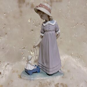 Collectible Lladro Pulling Doll Carriage